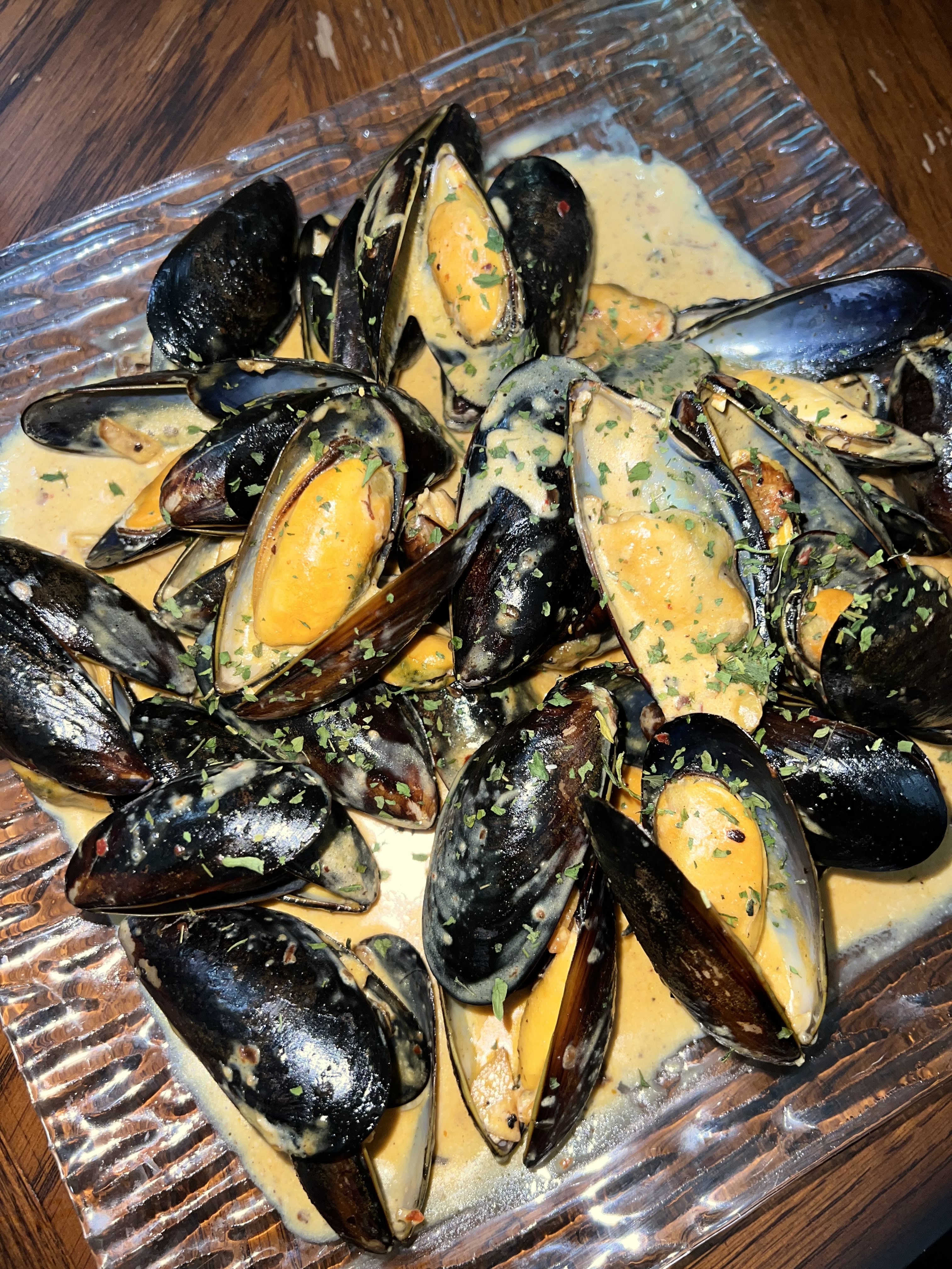 Creamy mussels seafood dish by Cilantro Academy graduate chef